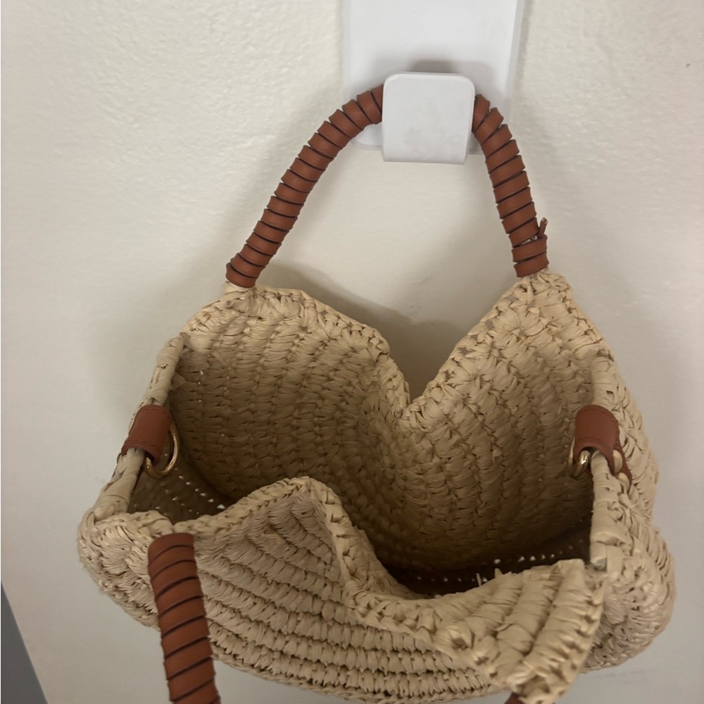 Woven Straw Round Tote Bag with Brown Wrapped Handles - Picture 2 of 5